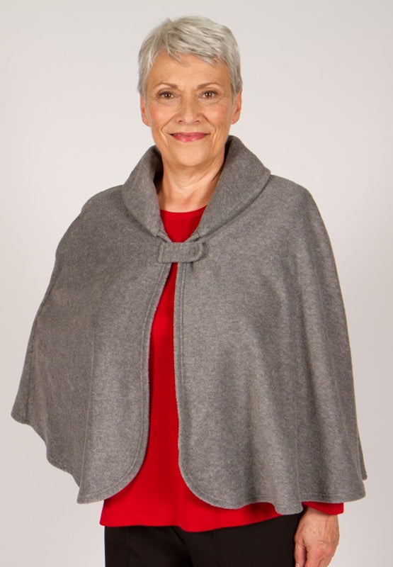 Stay warm and cozy with our Cape in Polar Fleece. This versatile bedcoat doubles as a cape, perfect for added warmth and style. Made with soft polar fleece, it's not only comfortable but also comforting. Available in pastel or classic colors for a touch o