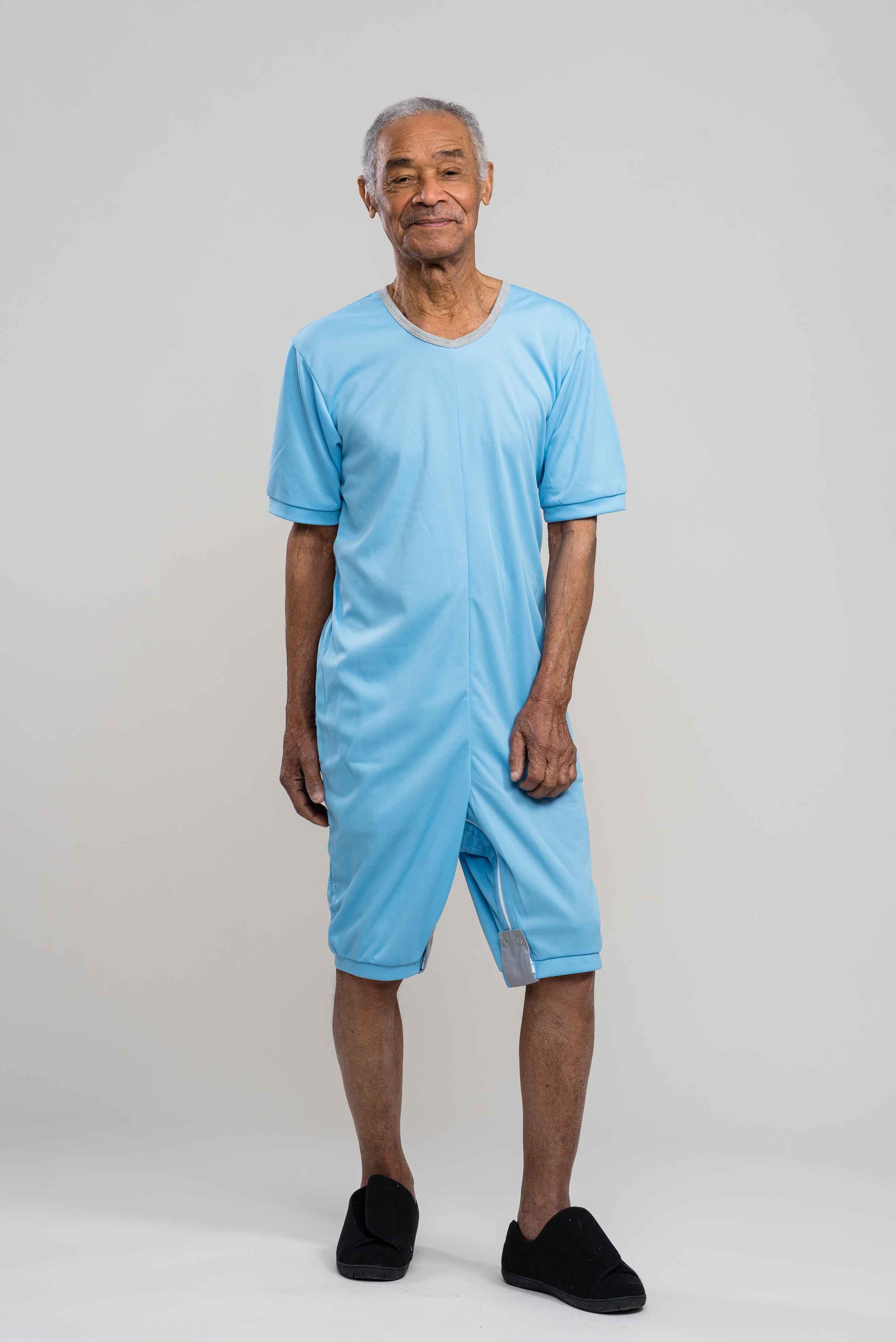 Adaptive short legs onesie designed for people suffering from dementia. A zipper on the back of the garment prevents the wearer from undressing.  A large, zippered crotch opening facilitates diaper changes.  Durable soft mesh knit dries quickly. Can be wo