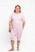 Adaptive short legs onesie designed for people suffering from dementia. A zipper on the back of the garment prevents the wearer from undressing.  A large, zippered crotch opening facilitates diaper changes.  Durable soft mesh knit dries quickly. Can be wo