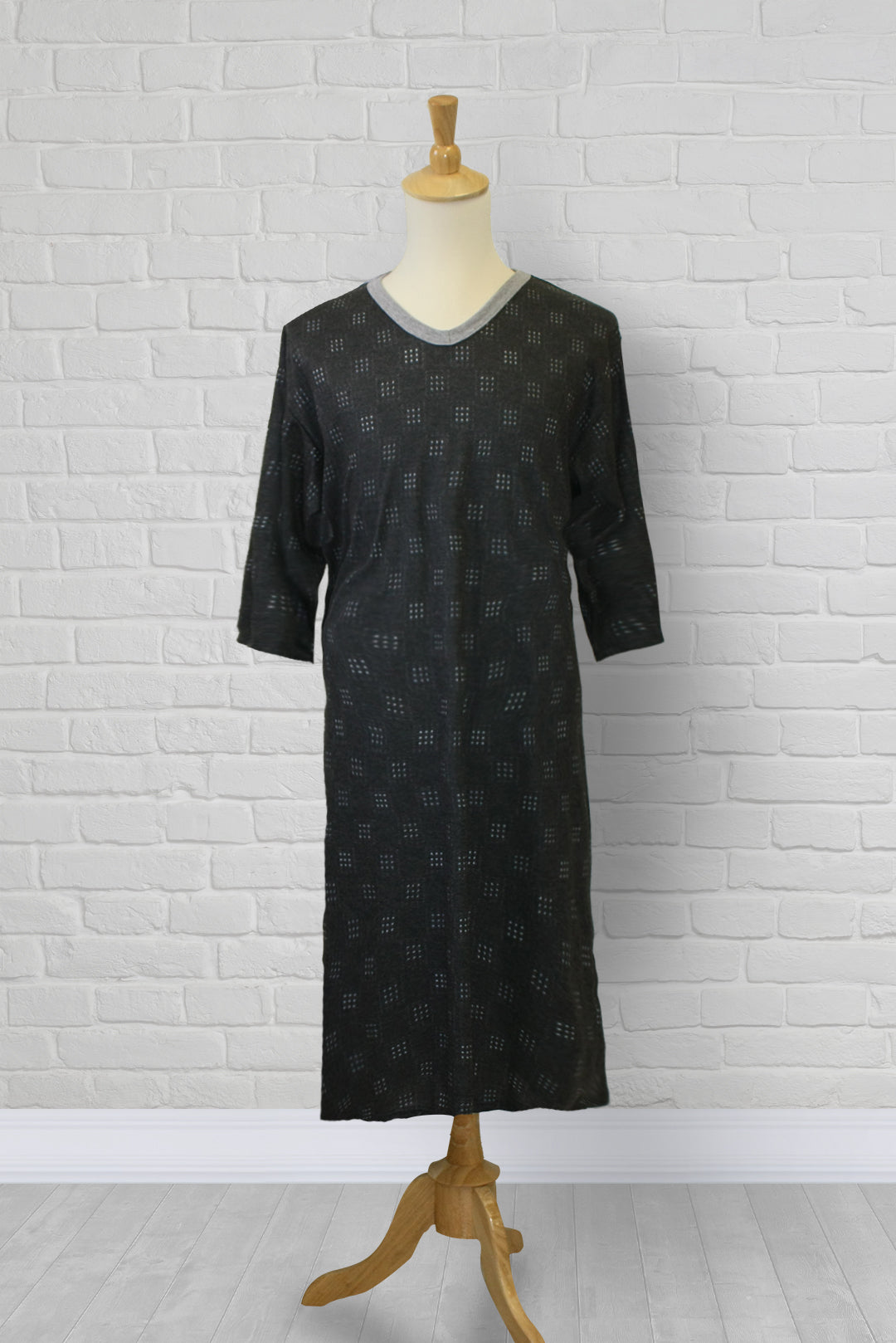 Adaptive nightshirt for men. Designed as a hospital gown, this soft knit is a blend of polyester and cotton.  Double panels prevent the garment from opening at the back. 
