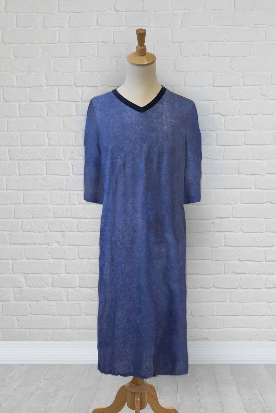 Adaptive nightshirt for men. Designed as a hospital gown, this soft knit is a blend of polyester and cotton.  Double panels prevent the garment from opening at the back. 