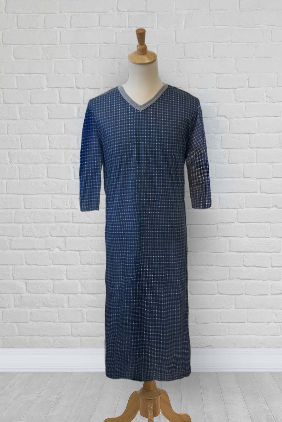 Adaptive nightshirt for men. Designed as a hospital gown, this soft knit is a blend of polyester and cotton.  Double panels prevent the garment from opening at the back. 