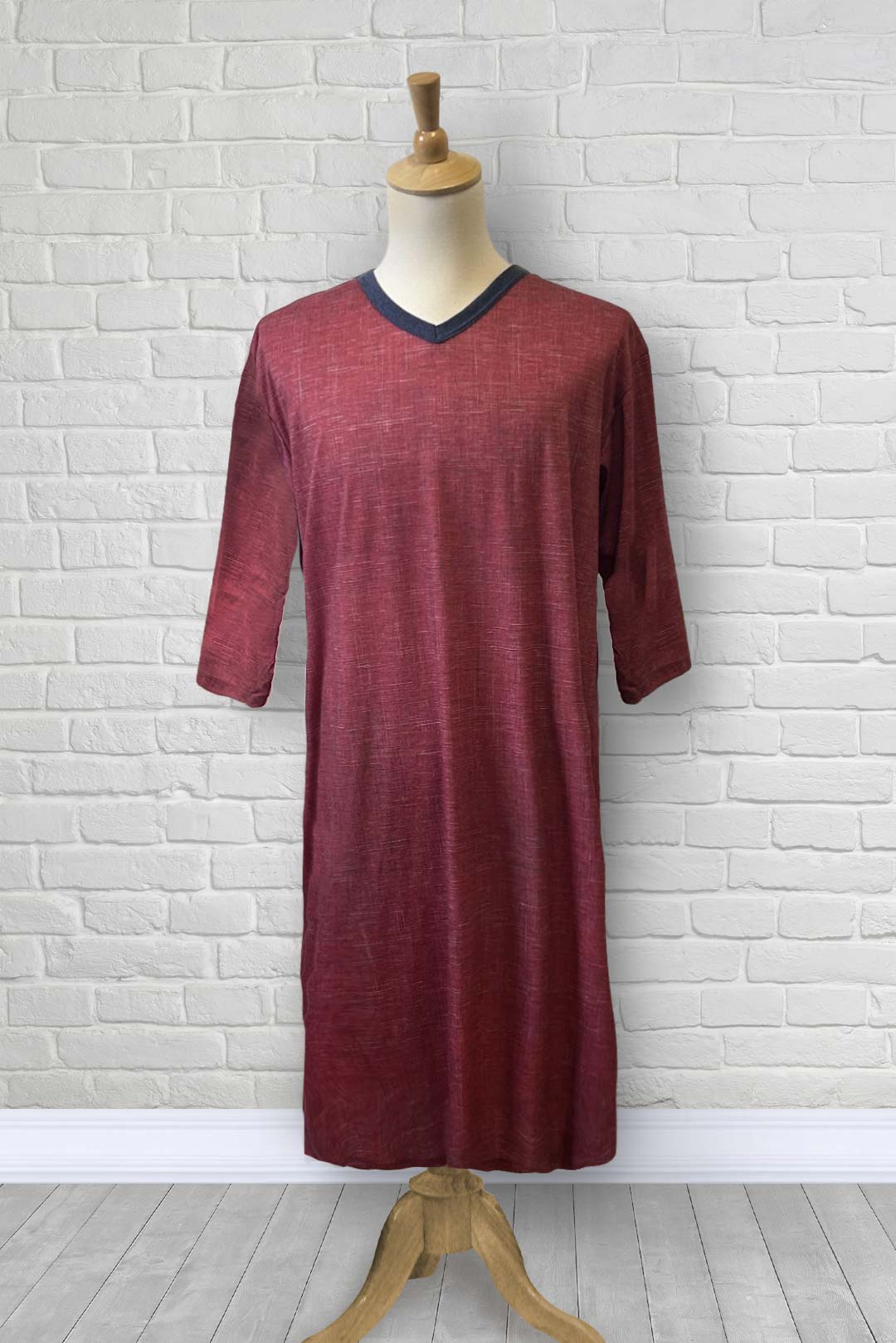 Adaptive nightshirt for men. Designed as a hospital gown, this soft knit is a blend of polyester and cotton.  Double panels prevent the garment from opening at the back. 