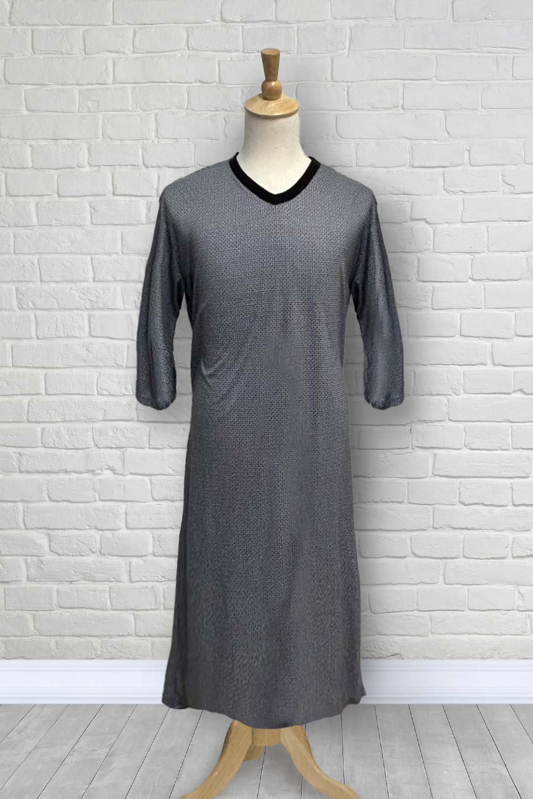 Adaptive nightshirt for men. Designed as a hospital gown, this soft knit is a blend of polyester and cotton.  Double panels prevent the garment from opening at the back. 