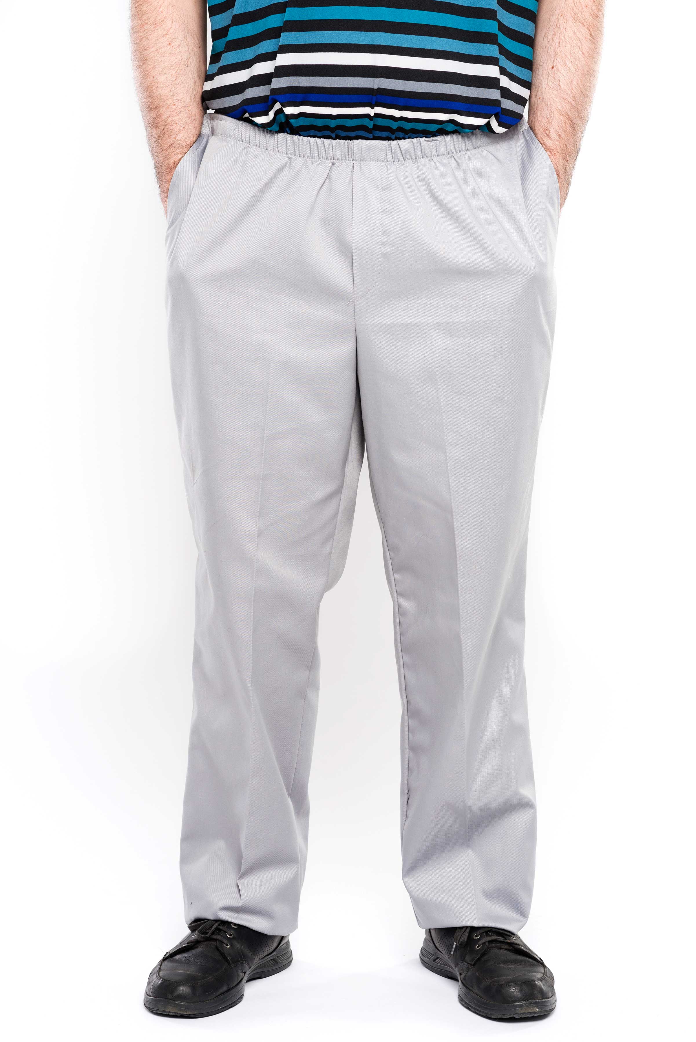 Our adaptive men's pants are designed to make dressing easier with their convenient side openings and snap closure. Made from a durable twill fabric and a comfortable polyester/cotton blend, these pants are also easy to care for with their machine-washabl