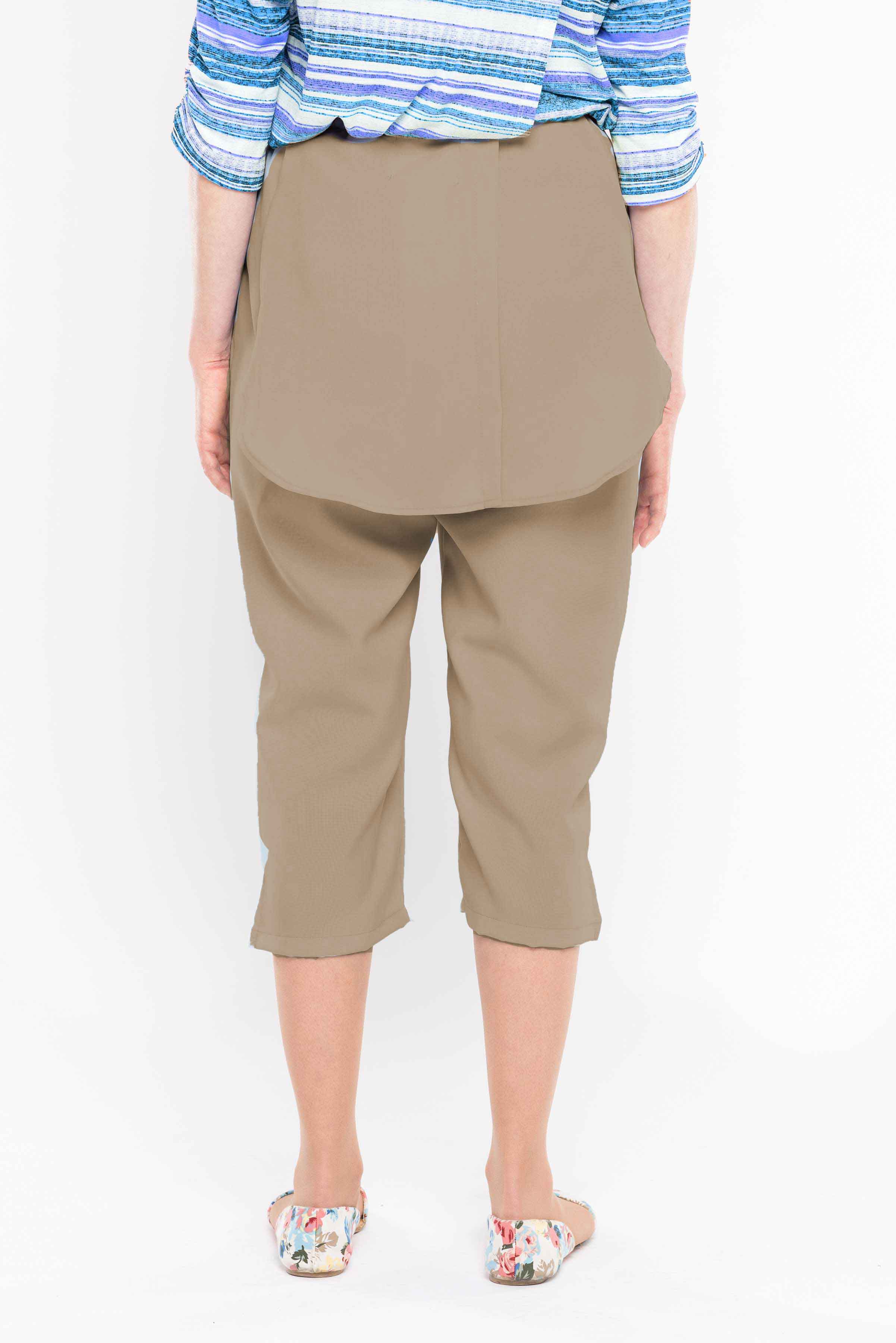 Stay cool and comfortable this summer with our adaptive capri. With a unique rear opening and dual panels to cover undergarments, this capri is perfect for warm weather. Made of machine-washable polyester, it's easy to care for and will keep you looking s
