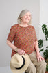 Stay comfortable and stylish with our 1ZT386-2B100 Adaptive Basic Top. The brushed knit fabric and short sleeves provide a soft and breathable feel, while the beautiful flower pattern in coral and pink adds a touch of charm to your wardrobe. Look and feel