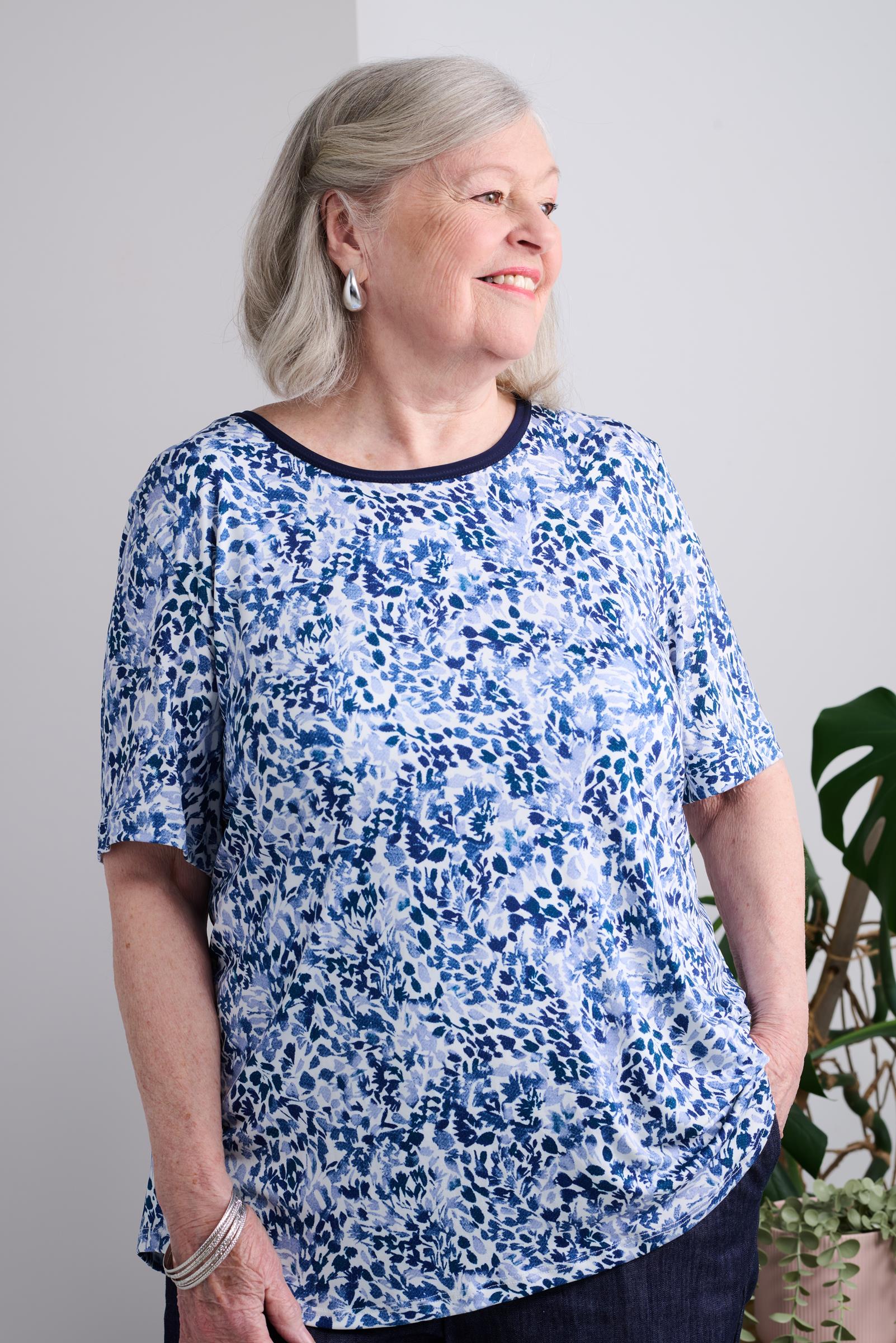 Introducing our Adaptive Basic Top Short Sleeves, with a round collar and stretch knit for ultimate comfort. This top is perfect for everyday wear and comes in multiple denim colors to suit your style. Stay comfortable and stylish with our adaptive top.