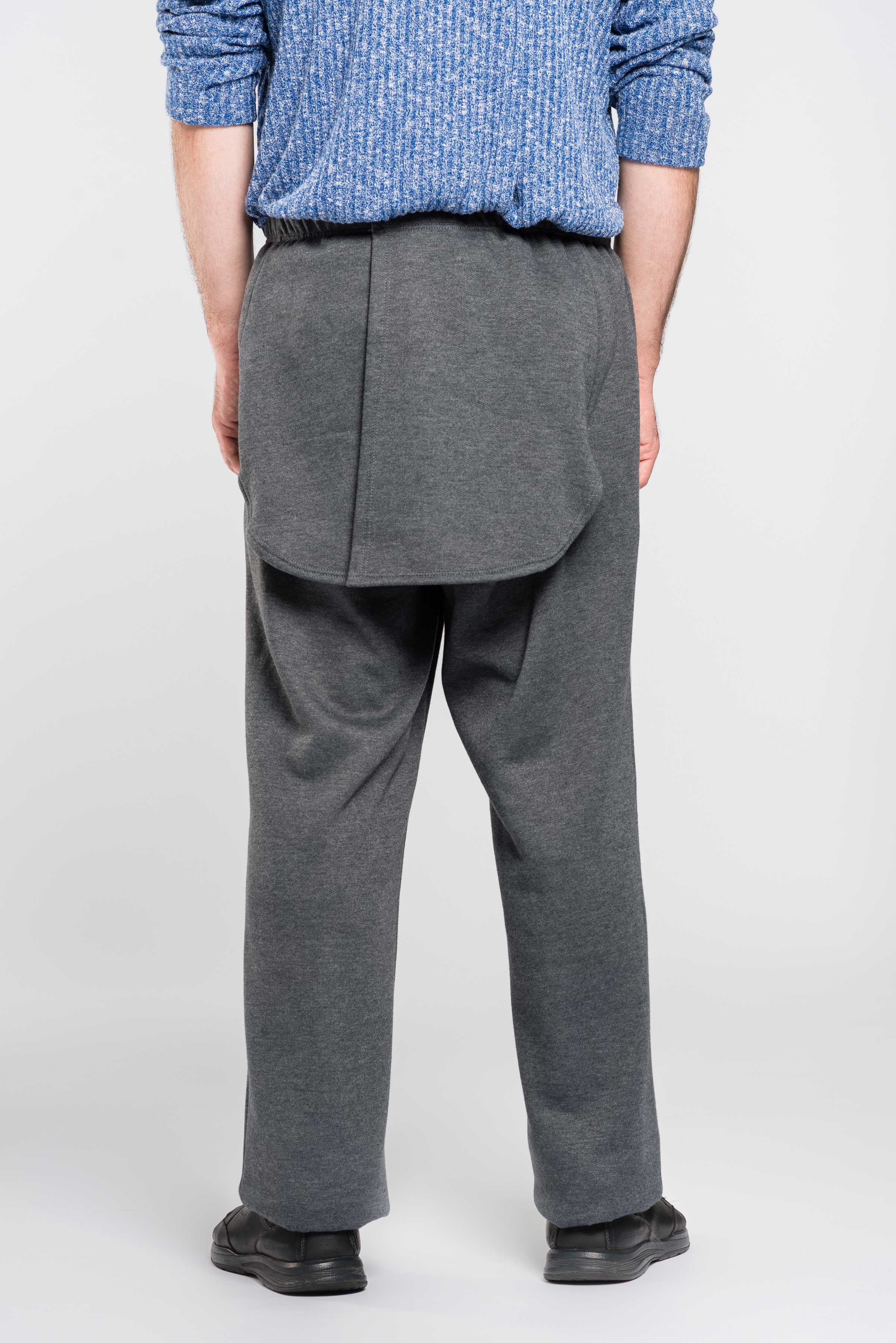 Introducing our Adaptive Pants for Men - perfect for those who struggle with incontinence. These pants feature double panels to discreetly hide diapers, while the soft lightweight fabric provides comfort and ease of movement. Made from a durable polyester