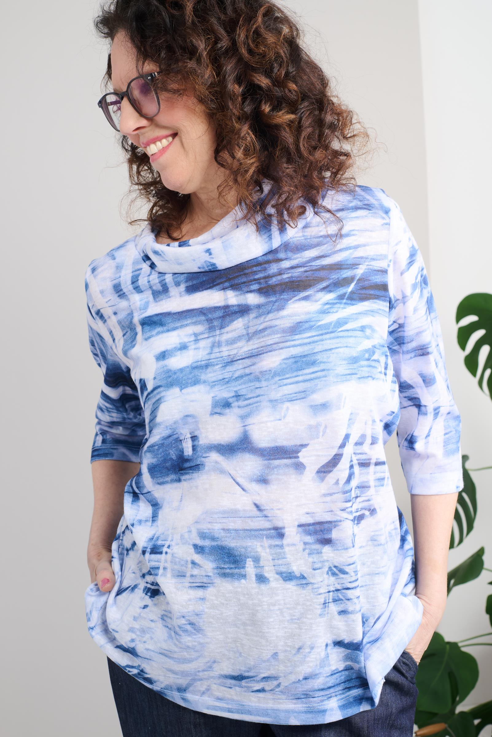 This adaptive top is designed to make getting dressed easier with its thoughtful features such as 3/4 sleeves and a shawl neck. The light weight knit fabric will keep you comfortable all day long. Choose this denim color to complete your wardrobe.