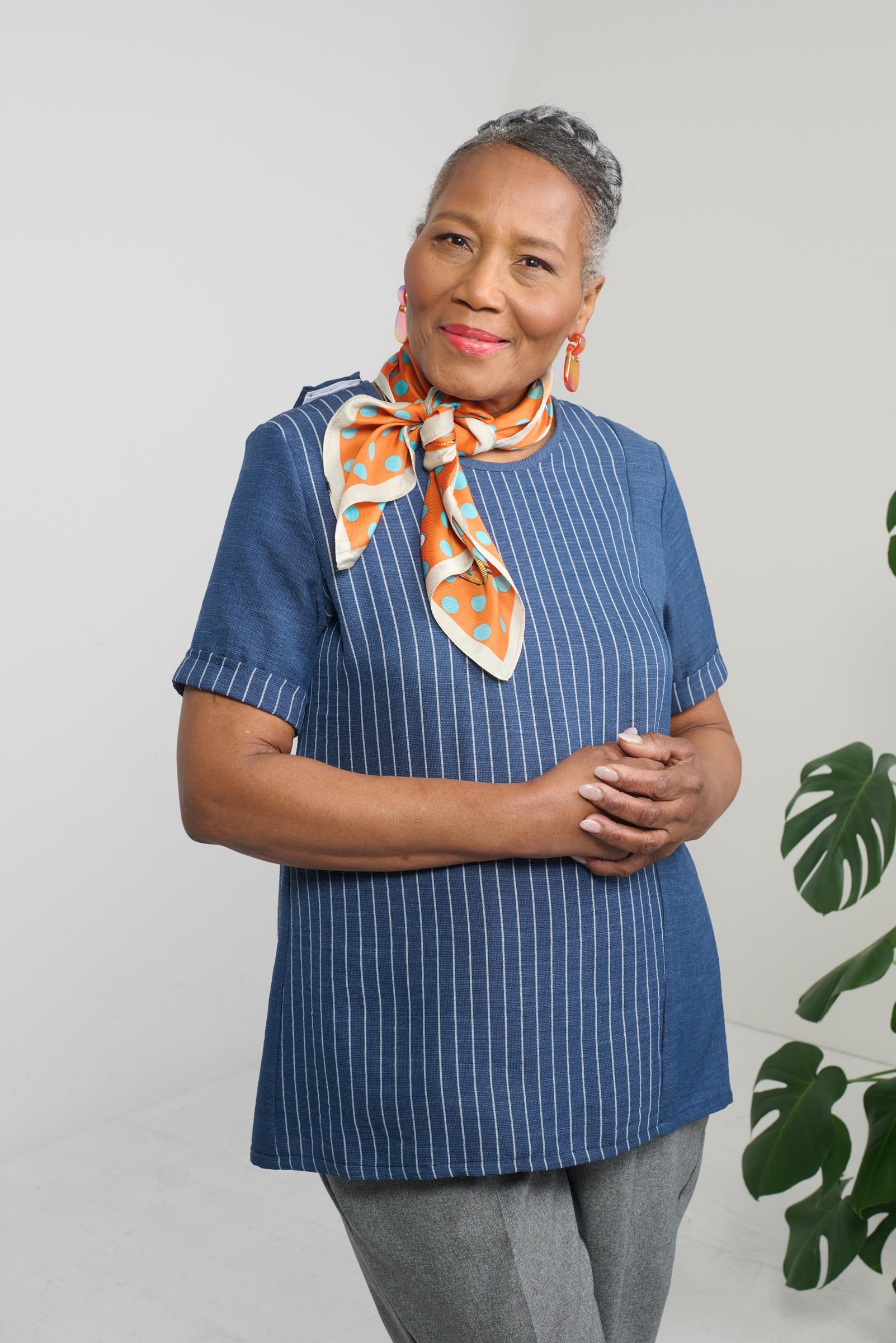 Stay stylish and comfortable with this adaptive top. This blouse features short sleeves and a linen look for a cozy yet chic look. The adaptive design ensures a perfect fit, while the contrasting striped pattern adds a touch of flair. Upgrade your wardrob